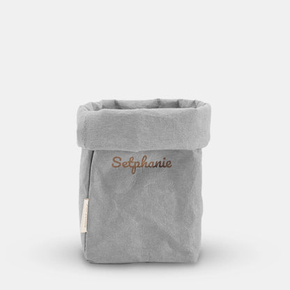 forstina washable paper container gray color with engraving text. engraving text loooks golden