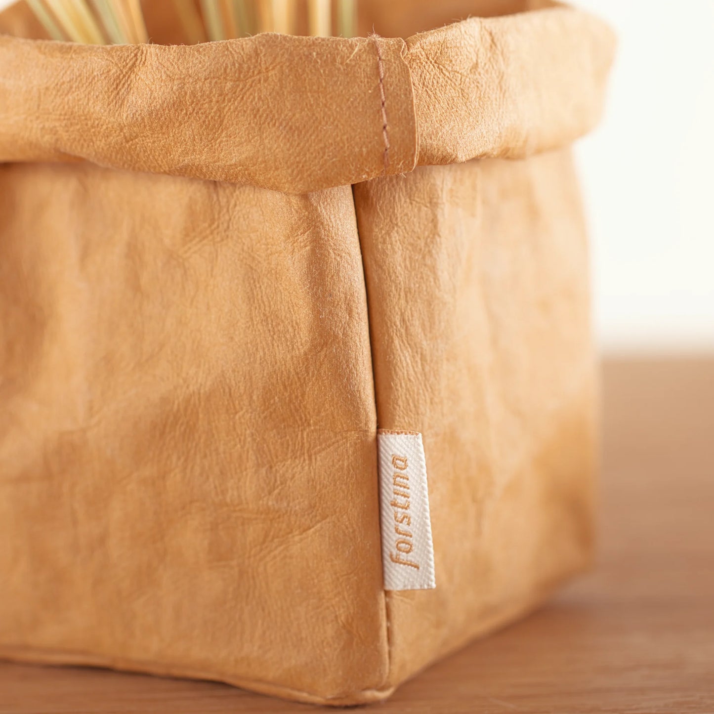 Combining sustainability and beauty, our paper bags are versatile and functional storage solutions for your home that can be repurposed time and time again.