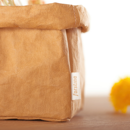 Environmentally friendly, recyclable and washable Kraft paper with leather like texture